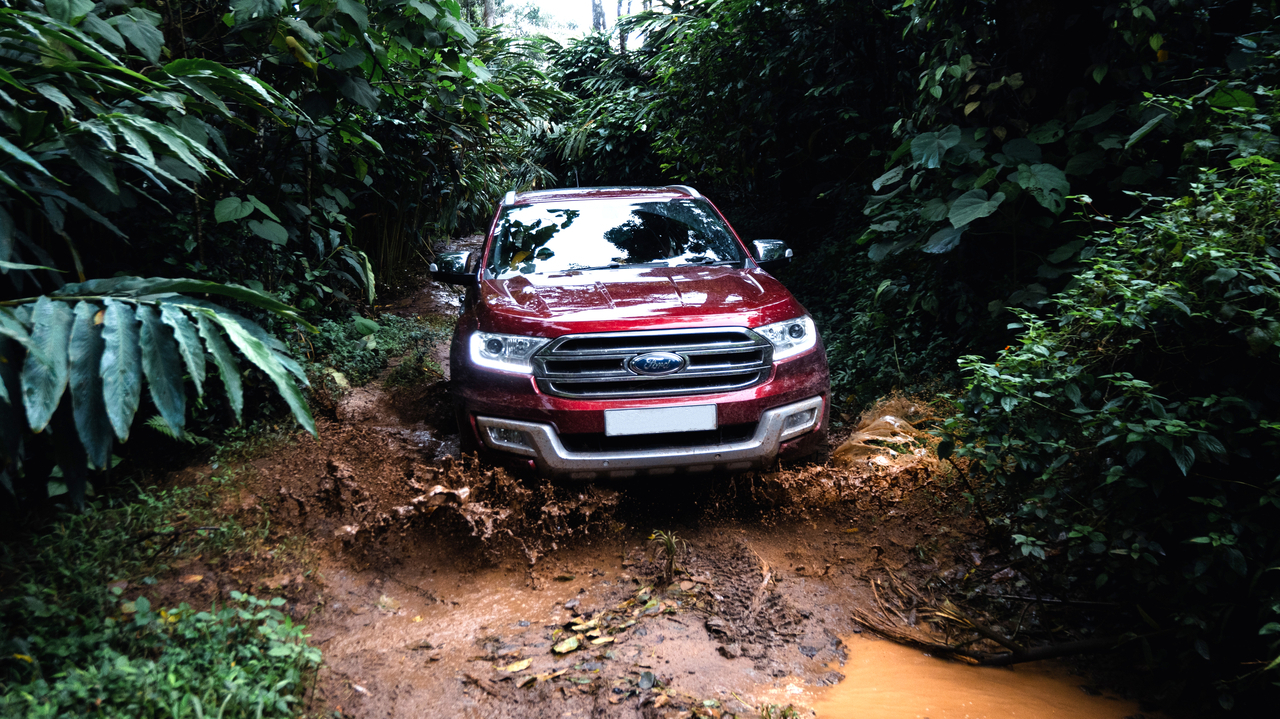 4x4 off-road vehicle on a forest trail in the Western Ghats
